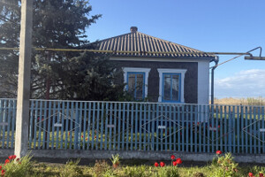 Продается уютный дом в пригороде Мариуполя, в поселке Сартана. 