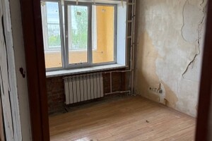 Продается четырехкомнатная квартира